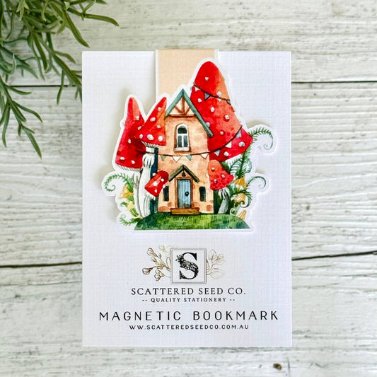 Magnetic bookmark with mushroom house design on a white card - The Book Keeper and Co