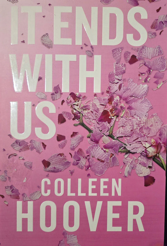 Book cover of 'It Ends with Us' by Colleen Hoover with floral design on pink background