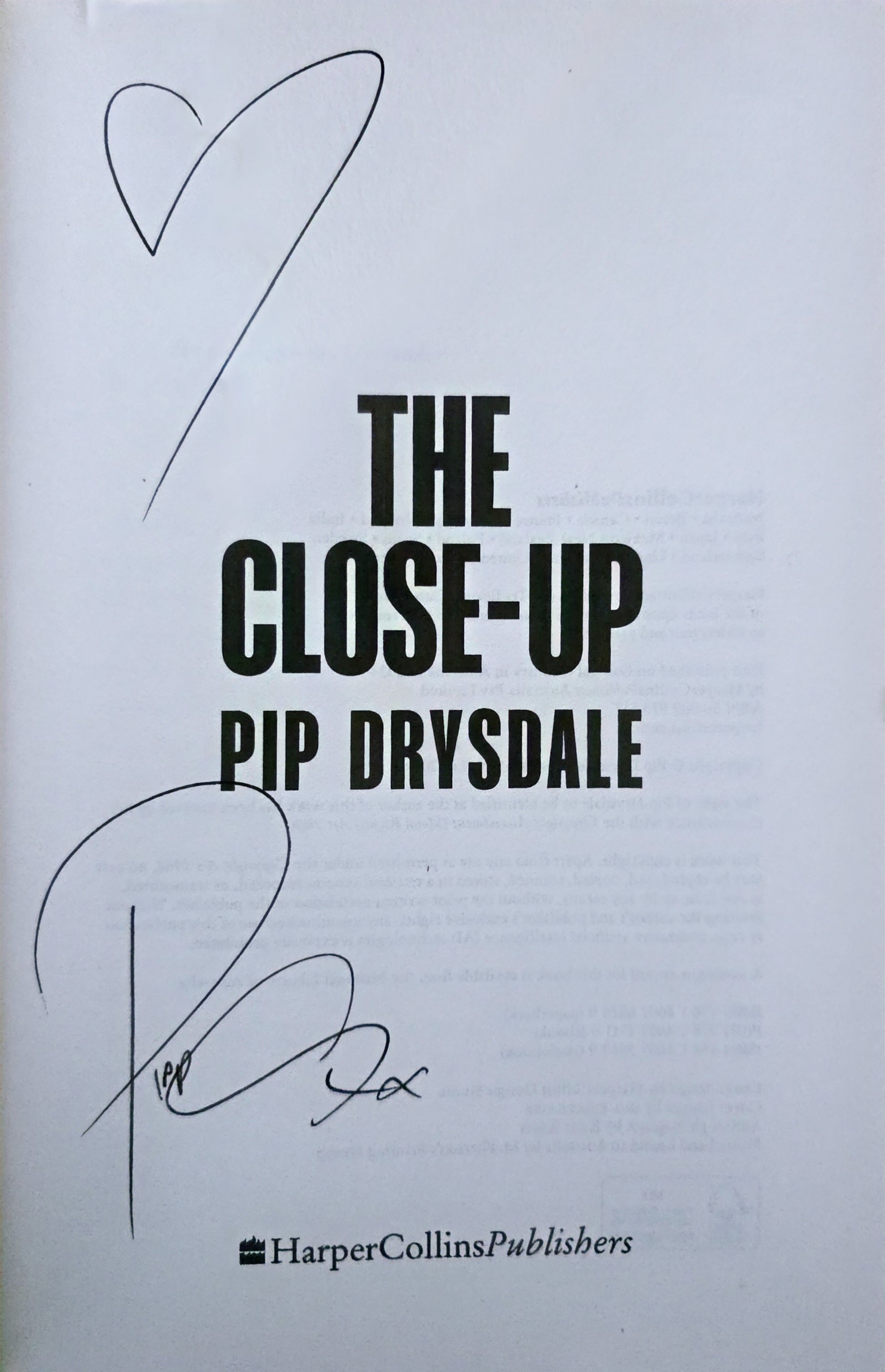 Inside of 'The Close-Up' by Pip Drysdale with HarperCollins Publishers logo on a light gray background. Signed by the author.