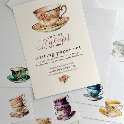 Writing paper set with vintage teacup designs and Scattered Seed Co branding.